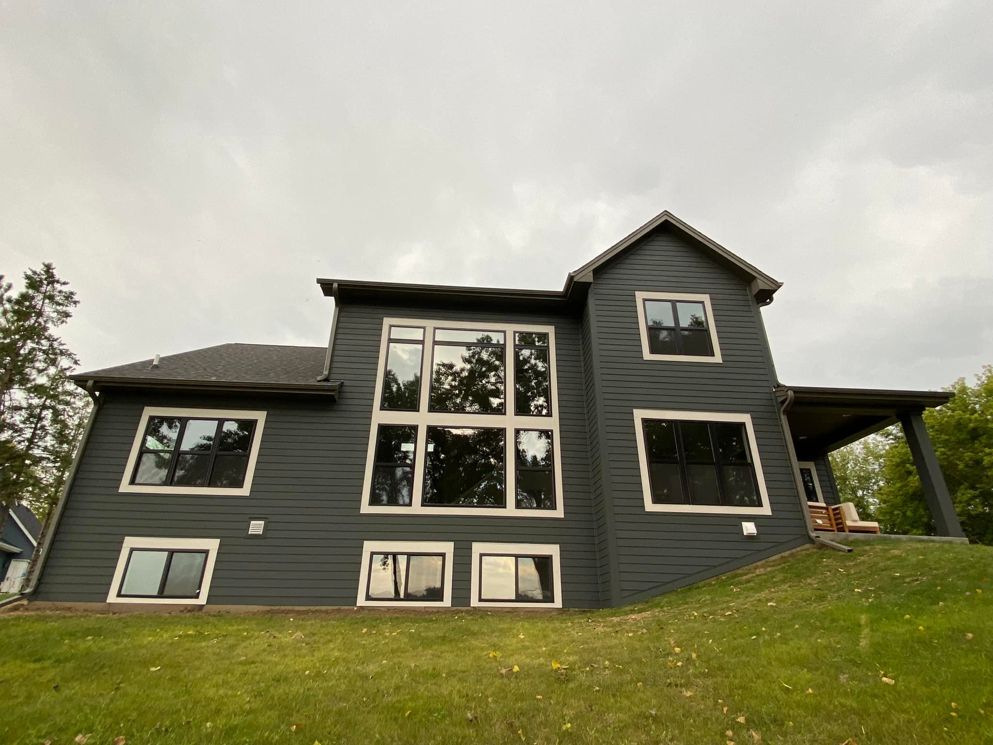 black exterior home with Duration from Sherwin Williams paint