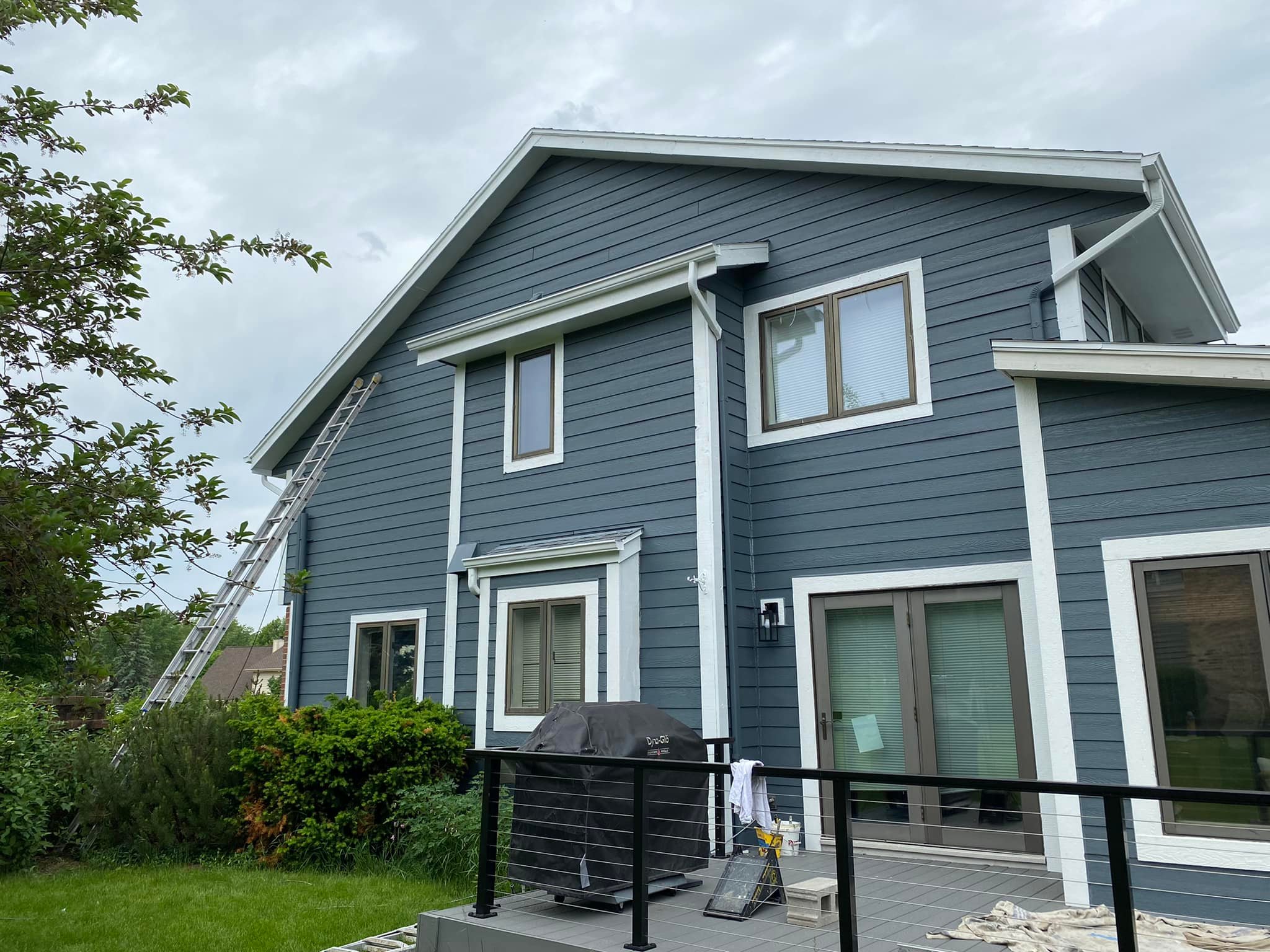 blue exterior painting project with Emerald Rain Refresh paint